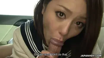 Japanese brunette teen has oral sex in a car with a mature guy uncensored.