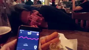 I took control of my stepsister's vibrator in the bar and brought her to orgasm.