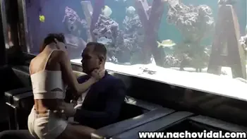 At a stylish strip club, Spanish Alexa Tomas meets Nacho Vidal. They make out in public, getting naked as they go. The trim beauty blows Nacho's colossal erection and strokes it with two hands.