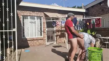 Outdoor fucking while taking off the laundry