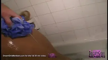 Short Haired Cutie Shaves Her Legs And Pussy