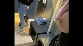 Secretly pussy fingered to orgasm in shopping center dressing room