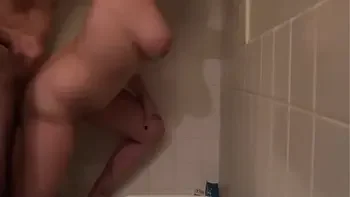 My boyfriend eats out my shaved pussy and fucks me hard standing up in the shower!