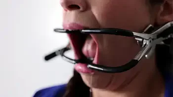 Extreme gag predicament - nailed to the wall