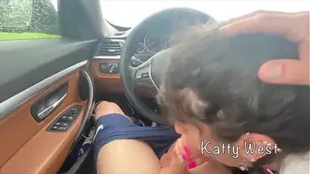 Whore sucks cock in a car and gets cum in her mouth