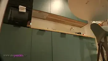 Panties Flash of a Cute Sexy Housewife on High Heels and Stockings in a Mini Short Skirt