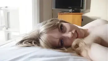 Busty Teen Scarlet struggles to free herself after being tied down to the bed.