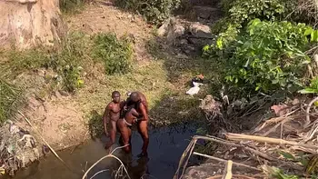 2 strangers taking turns to fuck this teenage village girl in the river