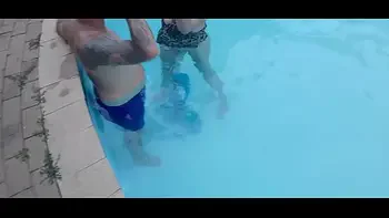 Neighbours wife handjob and finger fucking in swimming pool