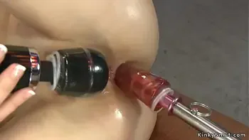 Embraced lesbians on anal machines