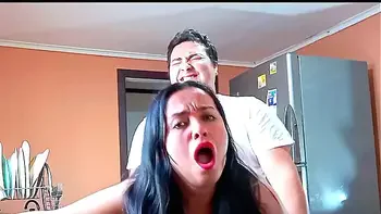 Fucking my stepmom in the kitchen topless and moaning loudly