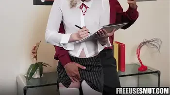 Young assistant freeused in front of her colleagues