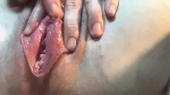 Close up- MILF Stella watches porn and plays with her clit head until she cums