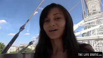 Tiny girl almost caught masturbating in public on a ferris wheel