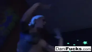 Sexy Dani has a hot black light threesome