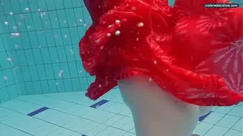 Hot naked girls underwater in the pool