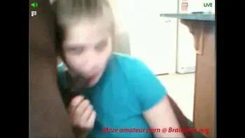Amateur girl gives interracial blowjob on cam
