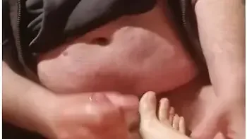 Footjob To A Fat Guy With Cum