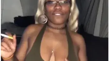 Smoking Milf Teases With Big Tits