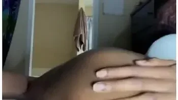 Ebony Babe Oils Up And Plugs Her Butt