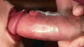 Slow motion. Close up fetish. Red lipstick in cum