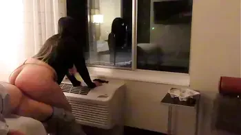 Having fun wearing a see through short dress in hotel public areas