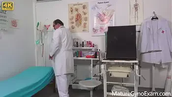 Hot ginger granny Angelina examined and made to cum by freaky doctor