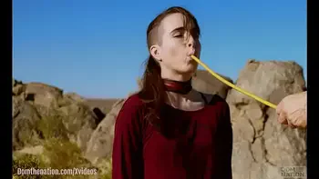 Petite, hardcore submissive masochist Brooke Johnson drinks piss, gets a hard caning, and get a severe facesitting rimjob session on the desert rocks of Joshua Tree in this Domthenation documentary