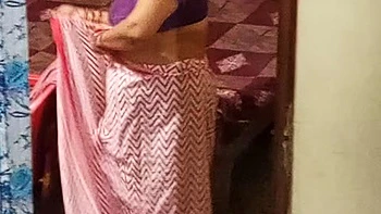 Aunty caught red handed on camera while changing dress.