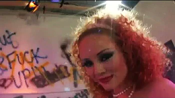 Redhead slut pounded in the public restroom