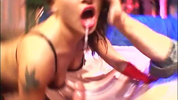 Gloves wearing brunette gets her ass hole drilled roughly