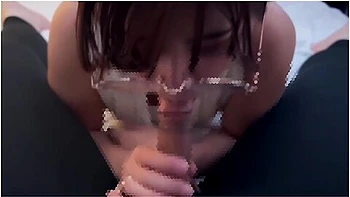 Girl With Glasses Doing A Blowjob While Making Erotic Sounds And Getting A Lot Of Sperm