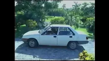 Busty natural 90's model changes bras and goes to the beach