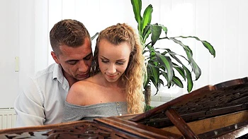 Angel Emily gets her pussy pounded from behind in a steamy scene.