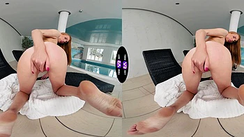 Redhead beauty Holly Molly wanking her pussy in the kitchen