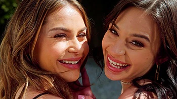 Two hot lesbians have sex on the pool in bikinis