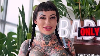 Personal With Tattooed Hottie With Tiger Lilly