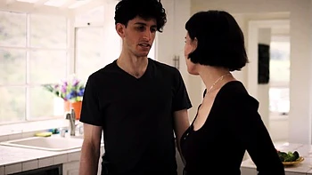 Brunette Bombshell Olive Glass Unveils Her Massive Tits in