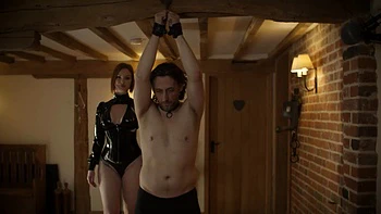 The couple Zara Durose and David Hughes fucks in latex clothes