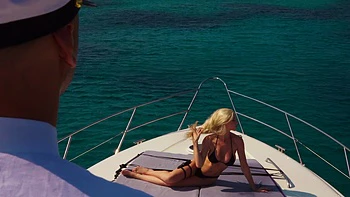 Kendra Sunderland rides a big dick on the beach with stunning tan lines.