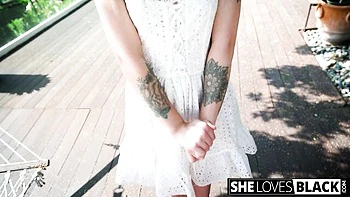 Petite Raven Lane teases with big ass and tattoos