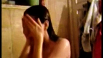 Asian Babe Strips on Chat Showing Big Tits