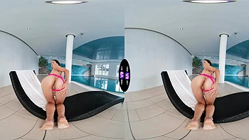 A young and beautiful girl, Vixi Rafi, has fun by the pool in vr
